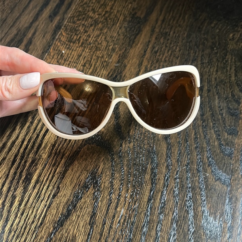 Vintage Yves Saint Laurent sunglasses!! Beige plastic frames with logo on side!